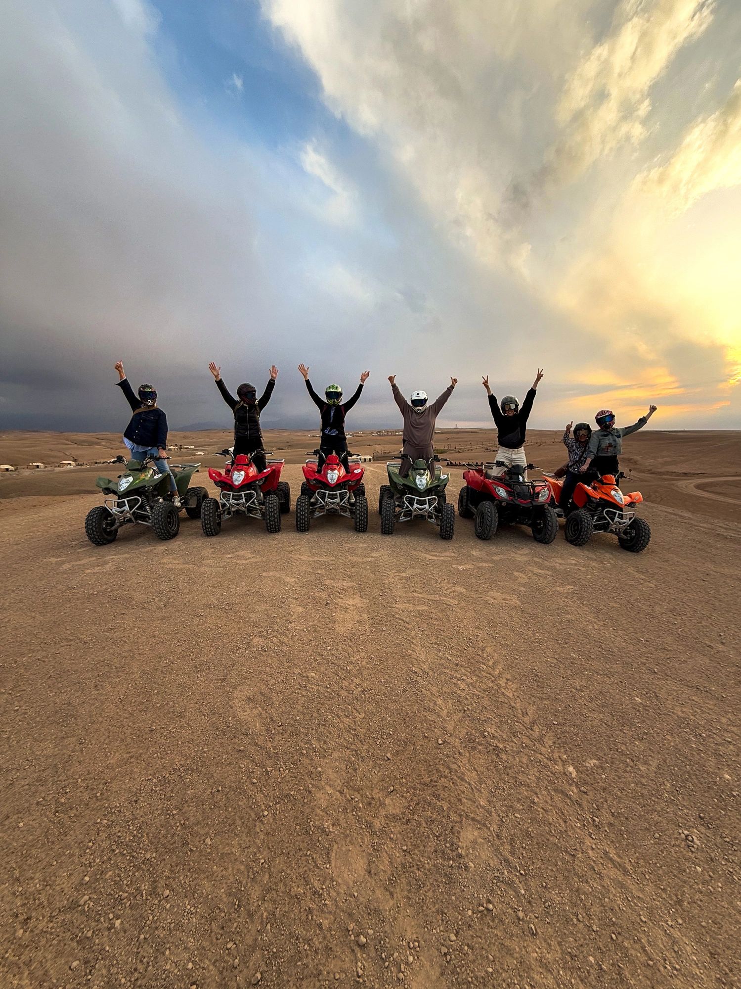 Group of Female Friends on Quad Bikes in the Desert